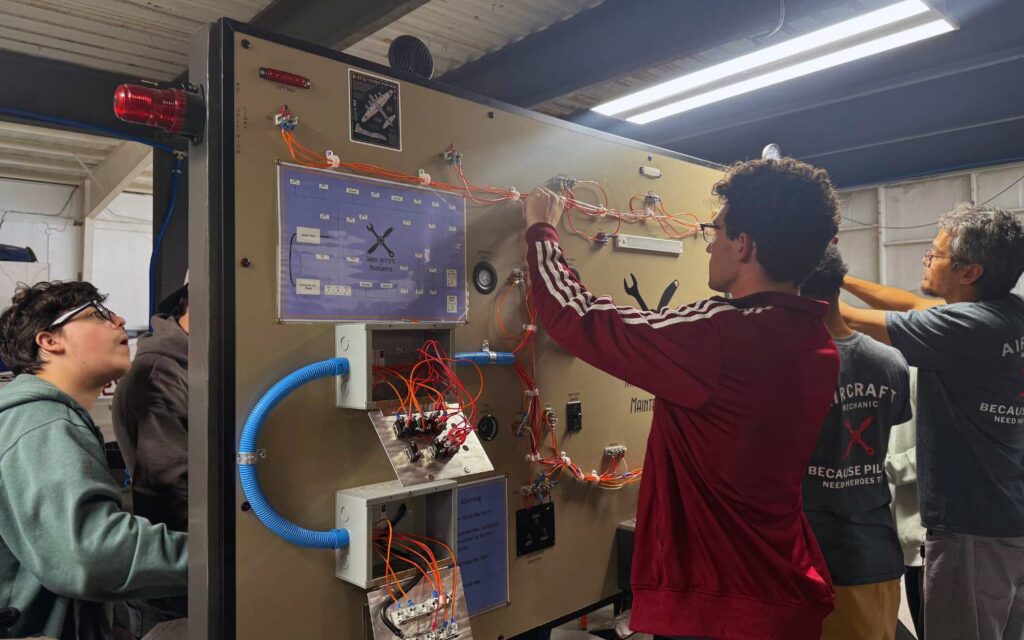 Mesa airplane mechanic school students